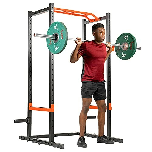 Man lifting weights on a squat rack.