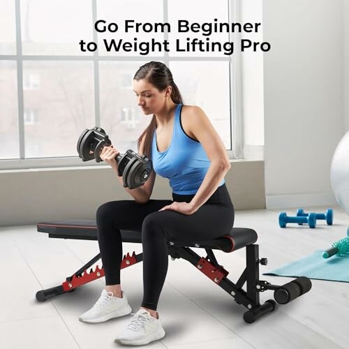 Woman lifting dumbbells on a bench in a gym setting